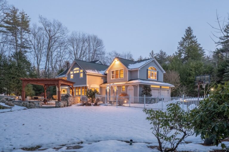 modern house covered in snow