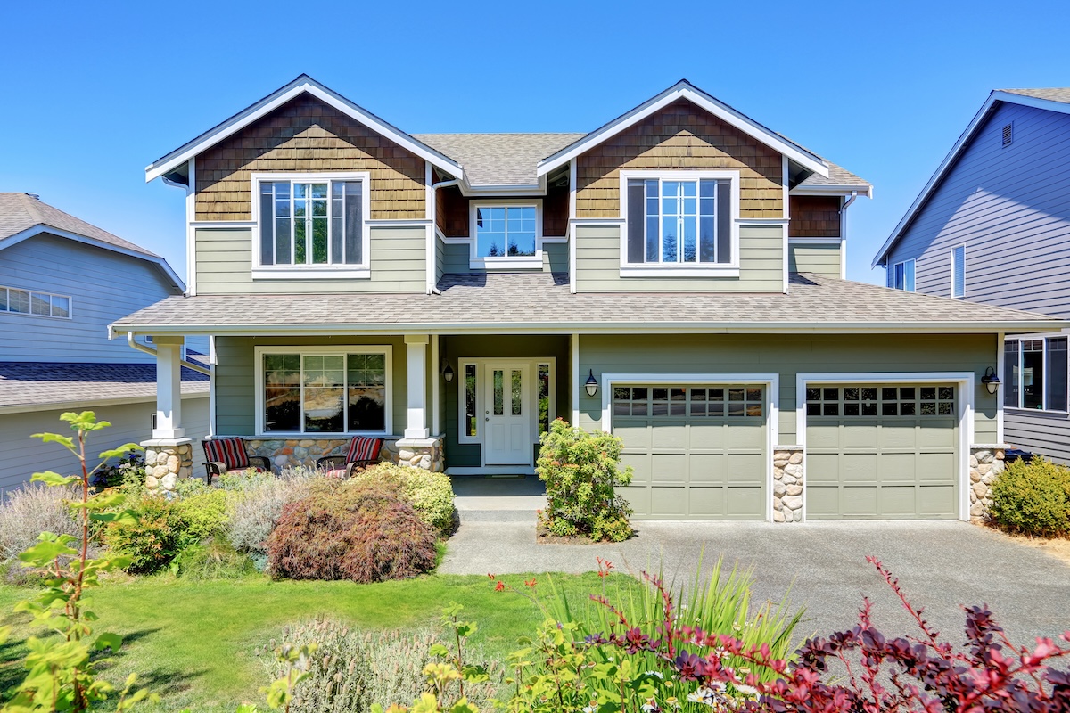 green siding on residential house