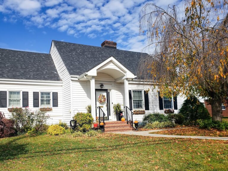 white siding on family home