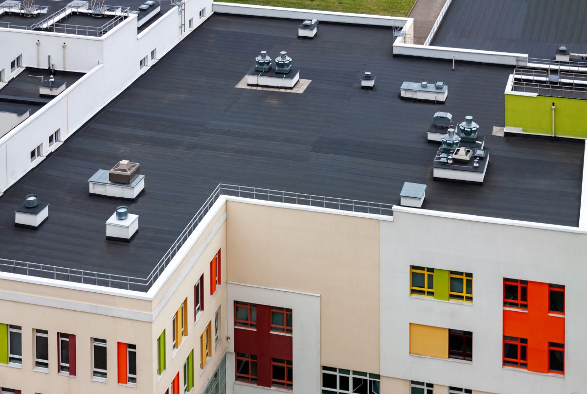 apartment complex with black roof