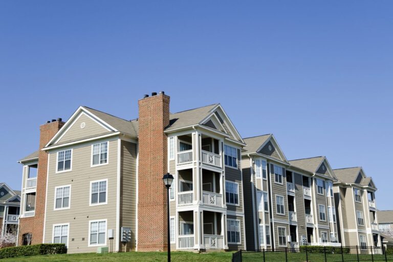 apartment complex with shingle roof