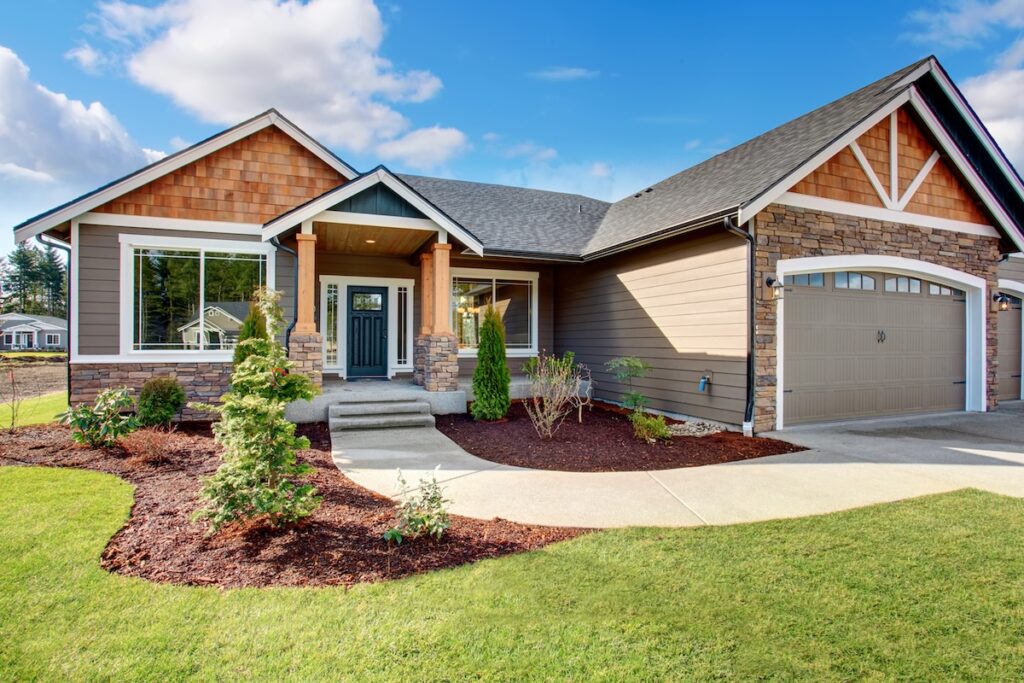 Large modern house with walkway and new roof