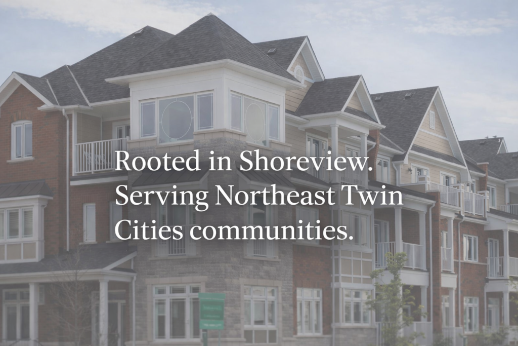 picture of a multi-family that owl roofing replaced the roof on and it says over the photo rooted in Shoreview. serving northeast twin cities communities because we are a multi-family roofing contractor