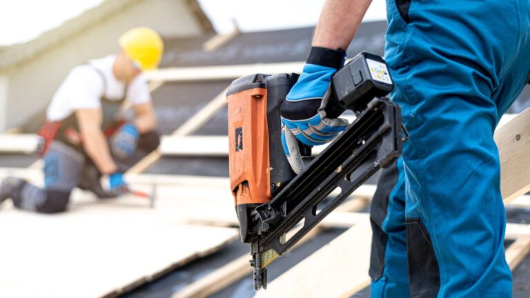 roofer with a nail gun