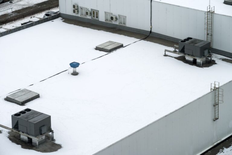 snow covered commercial roof
