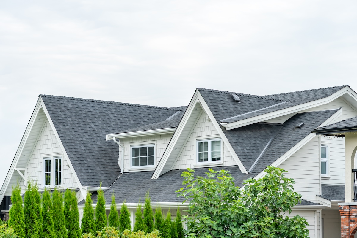 Top of luxury house with shingle roof