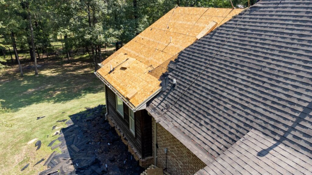roof deck and a new roof being installed