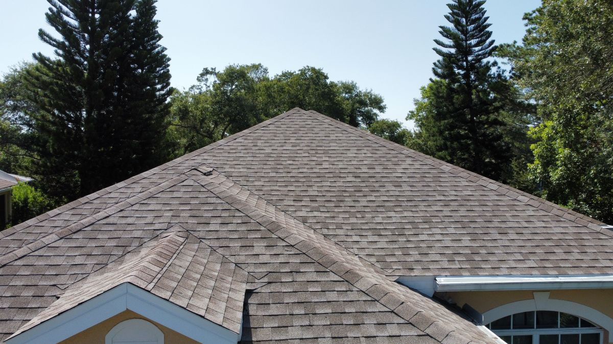 aerial drone photo of shingle roof of house