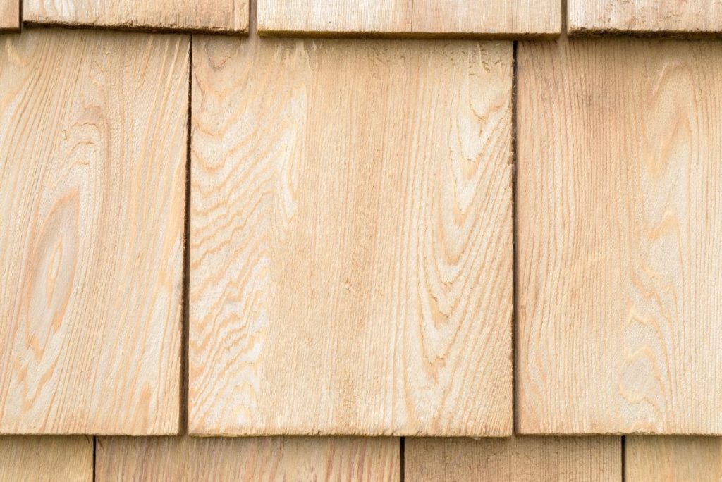 Several wood cedar shingles for siding