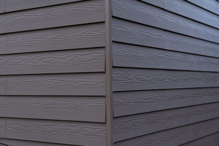 gray horizontal siding with a wood grain texture